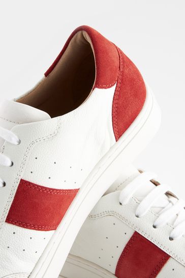 Red sole trainers best sale mens