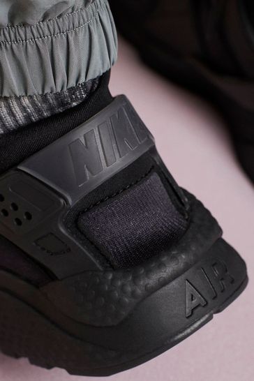 Buy Nike Air Black Huarache Trainers from Next Germany