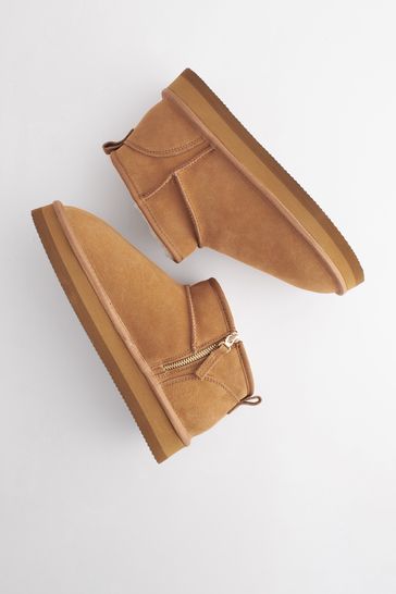 Fur lined new arrivals tan boots