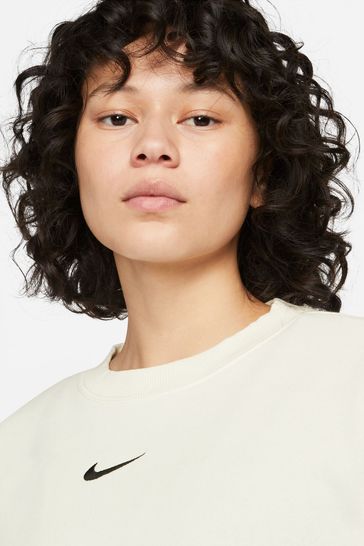 Nike mini swoosh hotsell oversized sweatpants in crea