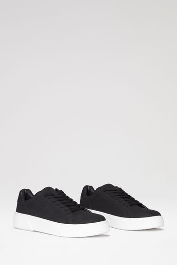 Raised sole trainers 2025