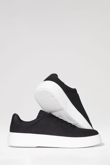 Raised hotsell sole trainers