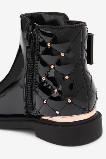 Black patent outlet studded boots