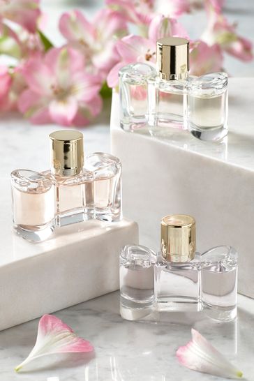 Perfume in bow shaped bottle store