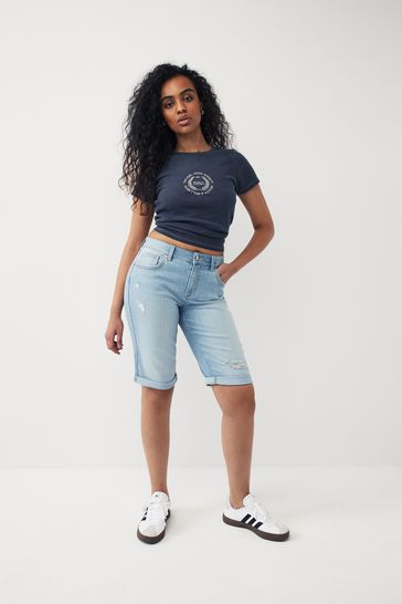 White denim knee length shorts top