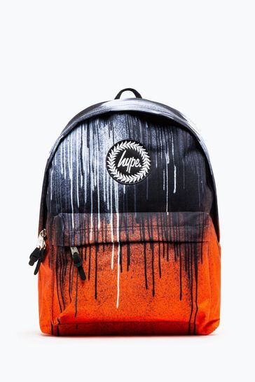 Mochila naranja con diseño unisex de efecto gotas y emblema de Hype.