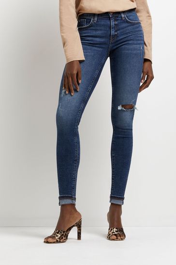 Ripped skinny jean on sale