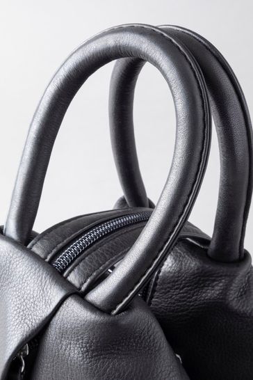 Metallic leather backpack store
