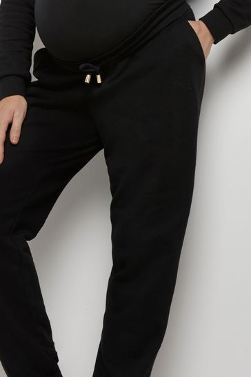 Comprar Pantalones de chándal negros con diseño premamá de River Island de  Next España