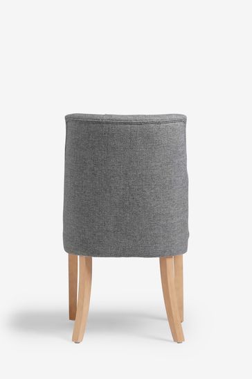 Light grey store tufted dining chairs