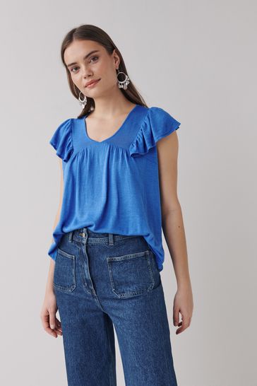 Navy ruffle sleeve top store