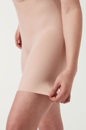 Buy SPANX® Nude Medium Control Thinstincts 2.0 Open Bust Mid Thigh Shaping  Bodysuit from Next USA