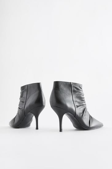 Black pointed best sale ankle boots leather