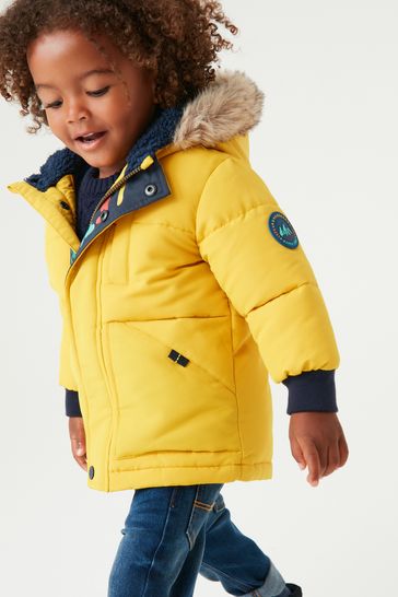 Yellow coat next store