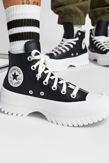 High top on sale converse black leather