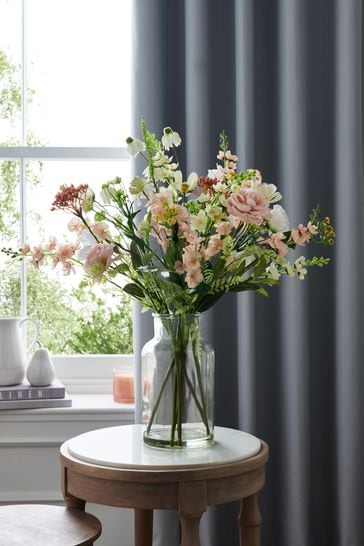 Pink Artificial Flowers In Large Glass Vase