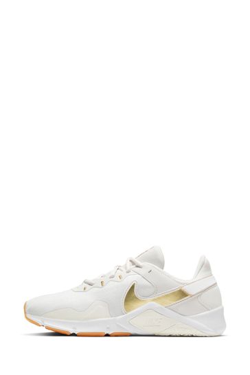 Buy Nike White Gold Legend Essential 2 Trainers from Next Ireland