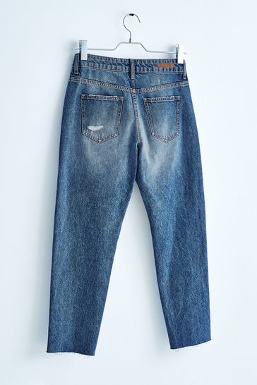 Own. Mid Blue Ripped Twisted Seam Mom Jeans