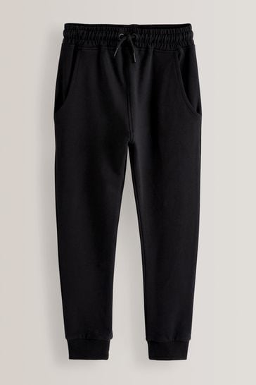 Pantalones de chándal negros largos con corte pitillo (3-16 años)