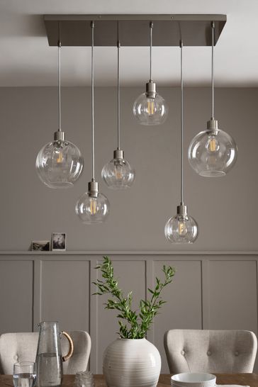 Linear cluster pendant outlet light