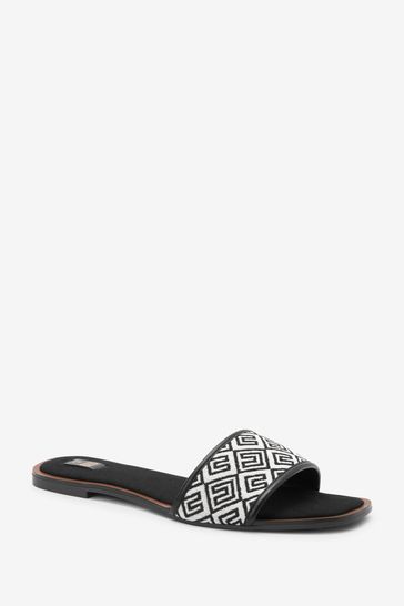 White flat store mule sandals
