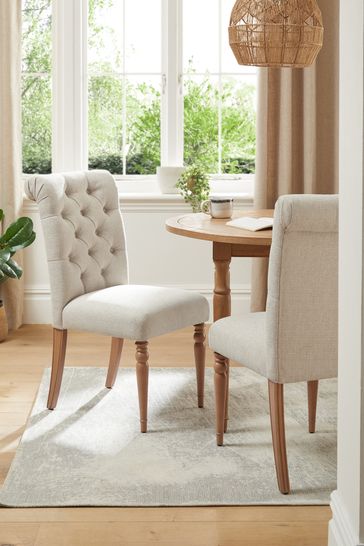 Upholstered buttoned top dining chairs