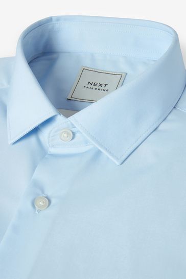 Blue shirt white top collar next