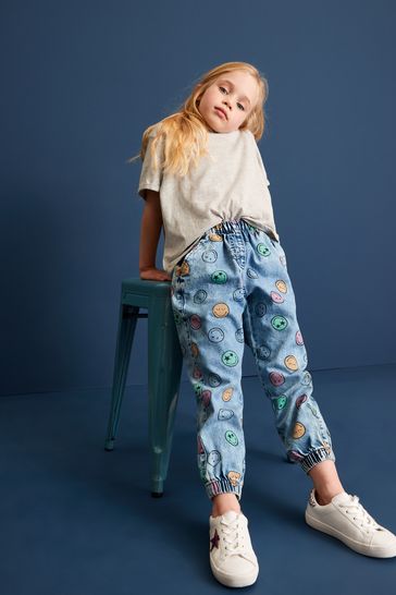 Buy Blue Smiley World Printed Denim Joggers 3 16yrs from Next Oman