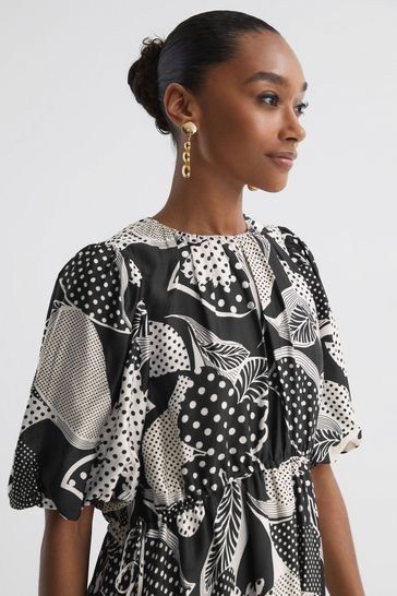 Buy Florere Polka Dot Puff Sleeve Mini Dress from Next Luxembourg