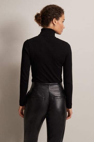 Black fine store knit polo neck