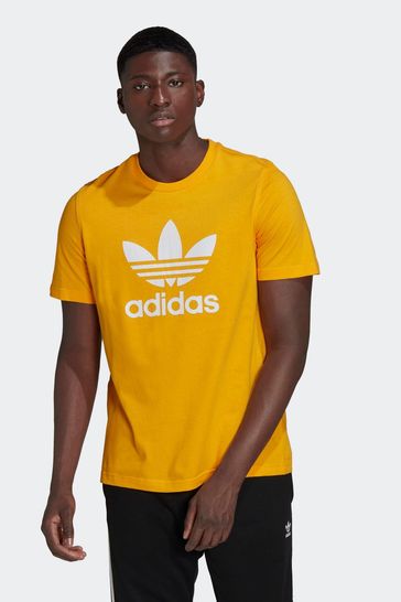 Adidas trefoil history top