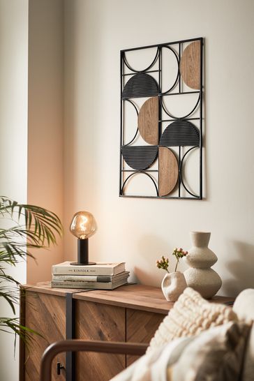 Black metal top wall art
