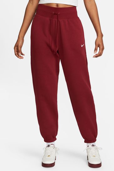 Mini swoosh hotsell nike joggers