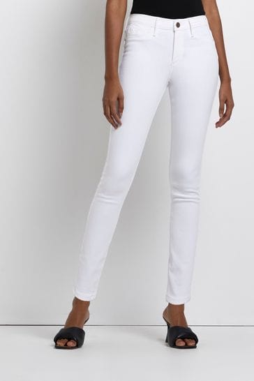 White skinny jeans river island hot sale