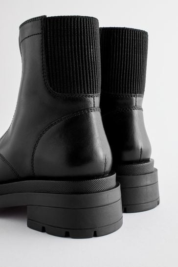 Zip front shop flat boots