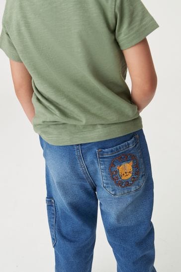 Jeans with embroidered sales cuff