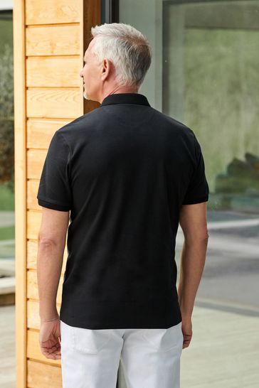 Buy Textured Polo Shirt from Next