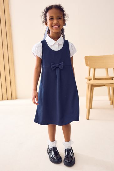 Navy Jersey Stretch Bow School Pinafore (3-14yrs)