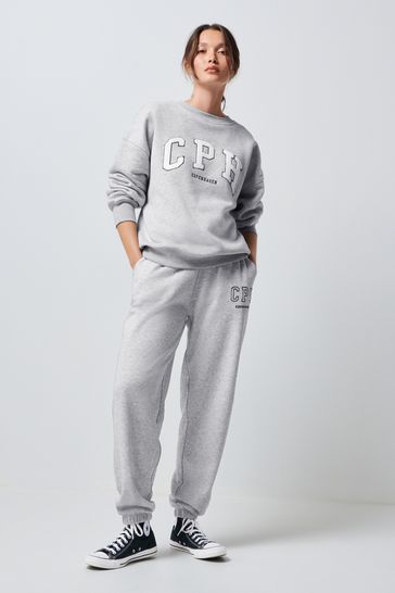 Grey graphic joggers sales