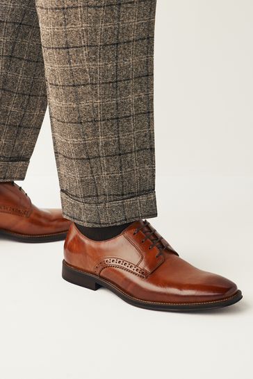 Black dress shoes with tan soles store