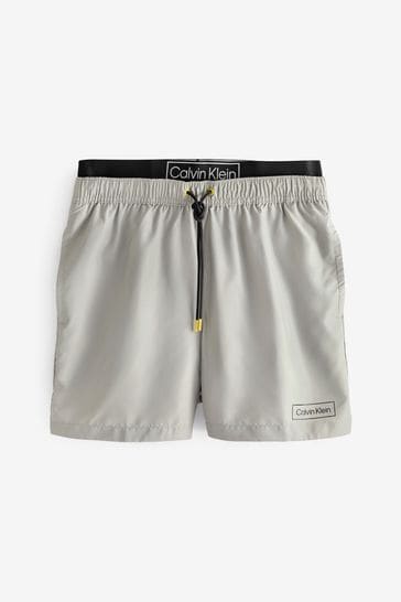 Buy Calvin Klein Grey Double Waistband Swim Shorts from Next Austria
