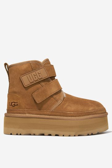 Buy UGG Kids Suede Neumel Platform Boots in Brown from the Childsplay Clothing UK online shop