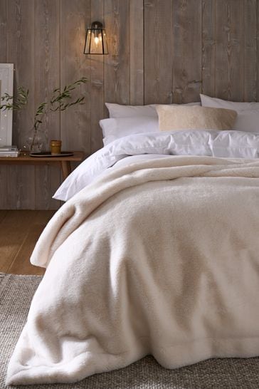 Buy Soft To Touch Plush Faux Fur Throw from Next