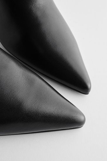 Flat pointed knee high boots store