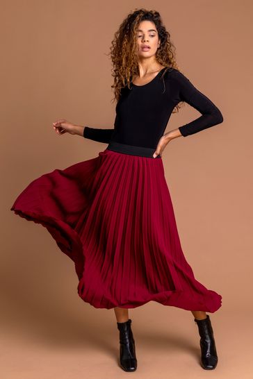 red pleated skirts