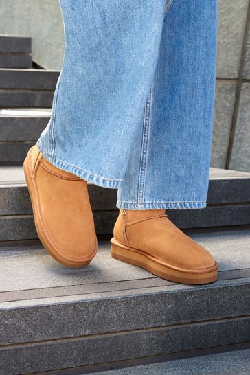 Fur lined suede ankle hotsell boots