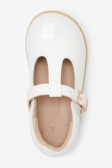 White patent t outlet bar shoes