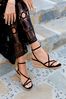 Linzi Black Aminah Strappy Wedge Sandal With Wrap Around Ankle Strap
