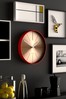 Space Hotel Red District 12 Wall Clock
