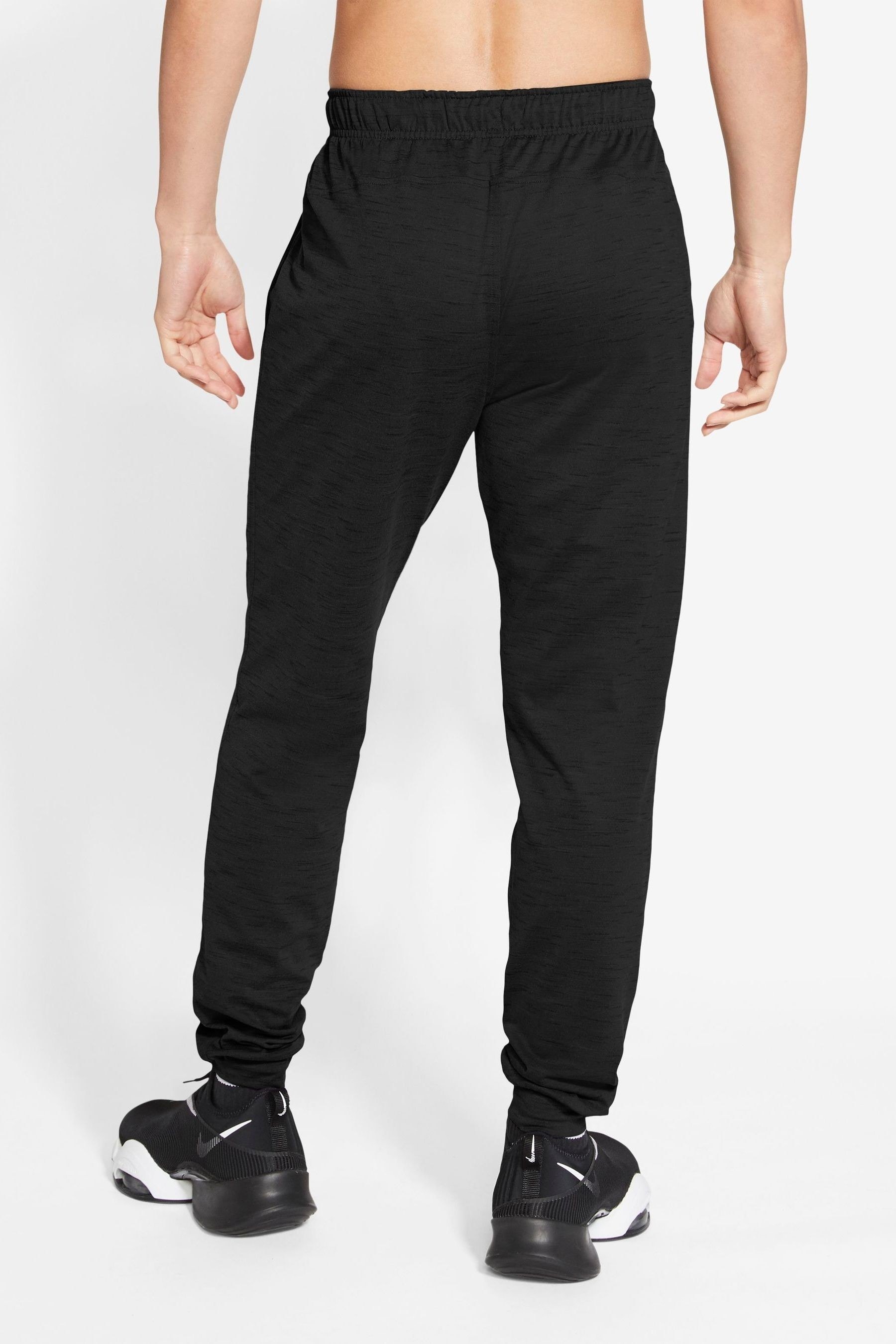 Buy Nike Yoga Dri-FIT Joggers from the Next UK online shop